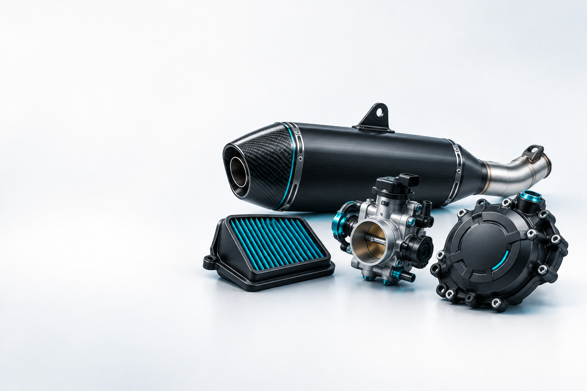 Motorcycle exhaust silencer, air filter, fuel-system component and engine cover.
