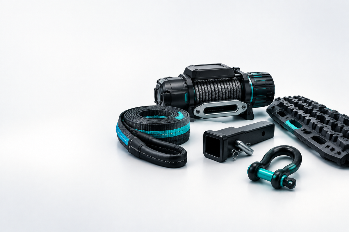Recovery winch, tow hitch, recovery strap, shackle and traction board.