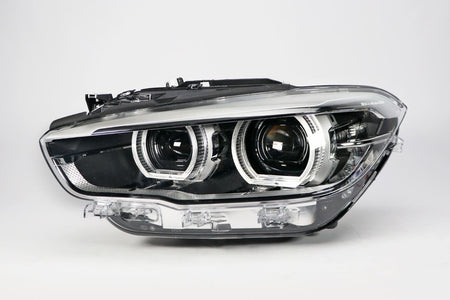 BMW 1 Series Left Headlight, Hella OEM, OEM 63117414147, MPN 1LX 011 930-431