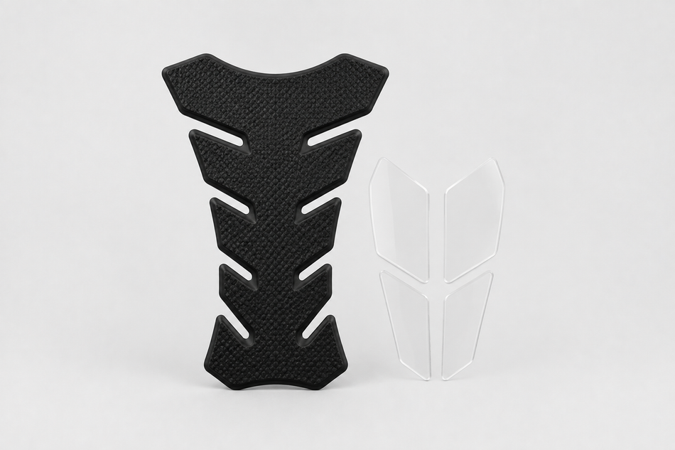 Motorcycle tank grip pad and protective film pieces on a light grey background.