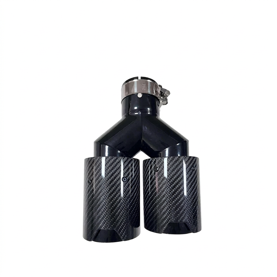 Twin-outlet carbon fibre exhaust tip assembly on a white background
