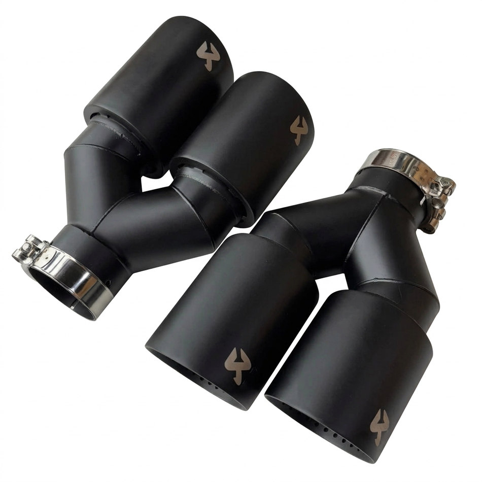 Pair of matte black twin exhaust tip assemblies on a white background
