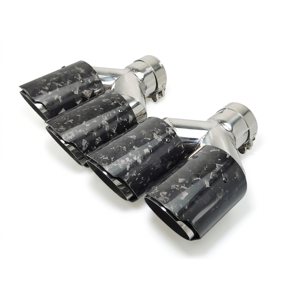 Pair of twin forged carbon fibre and stainless steel exhaust assemblies on white