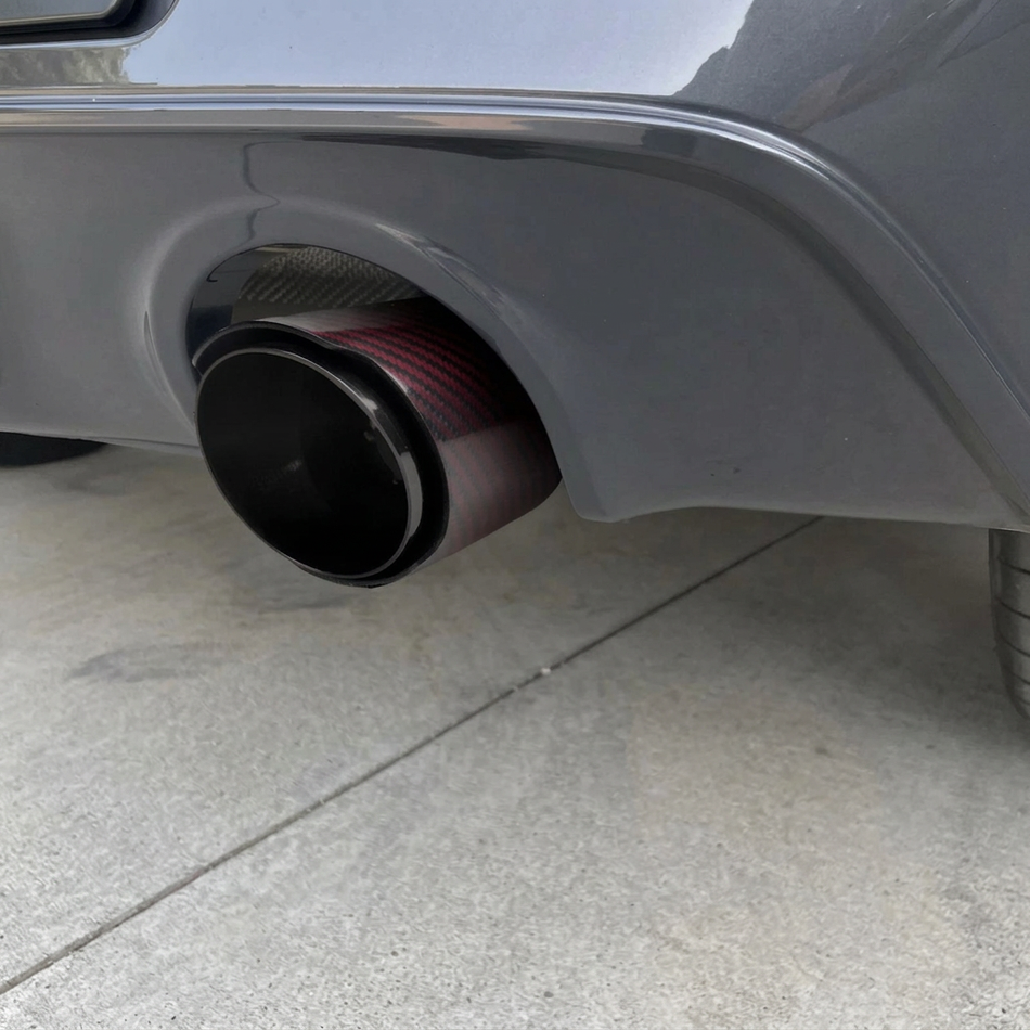 Red carbon-fibre exhaust tip fitted to the car